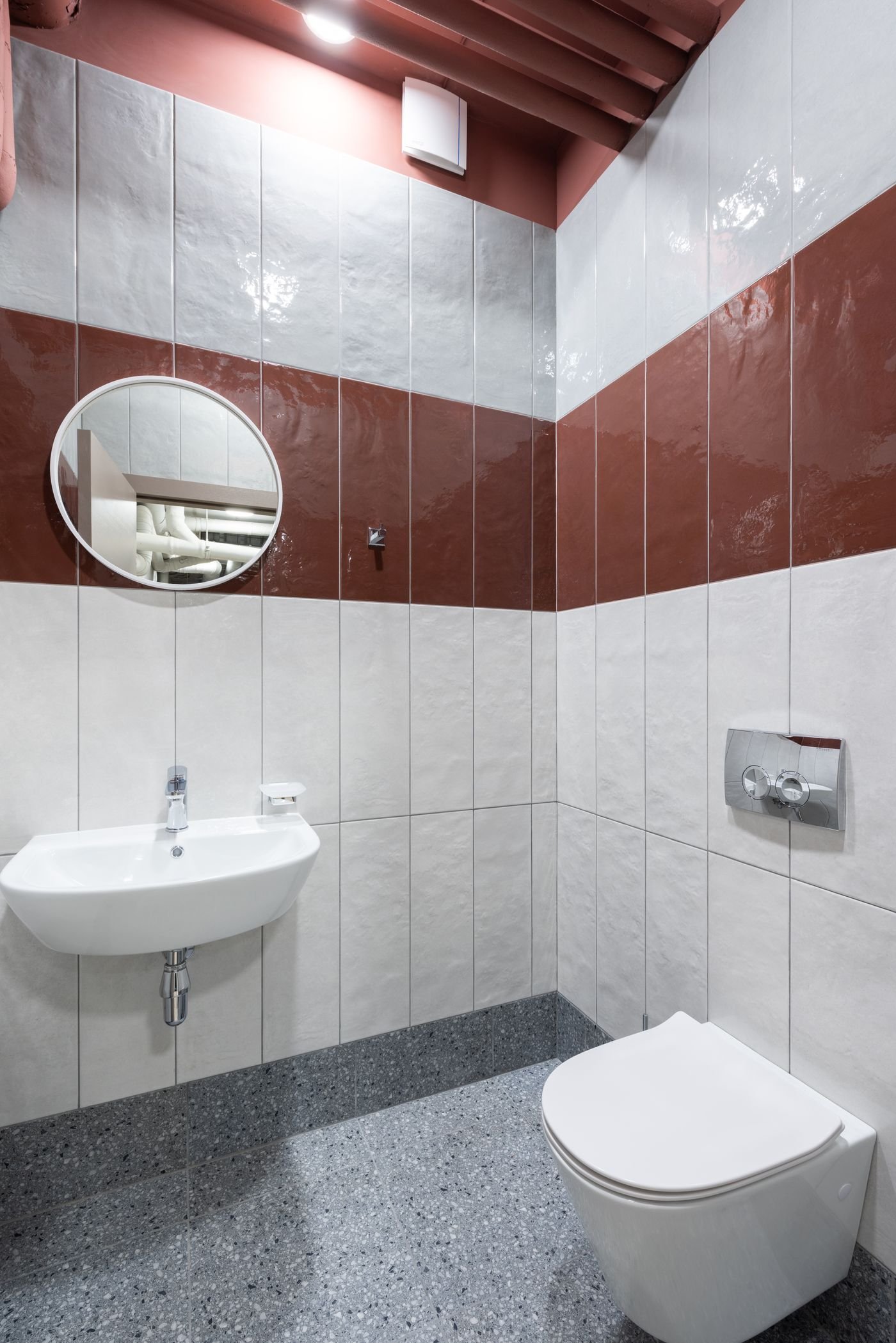 Ceramic tiled walls in a bathroom wet area